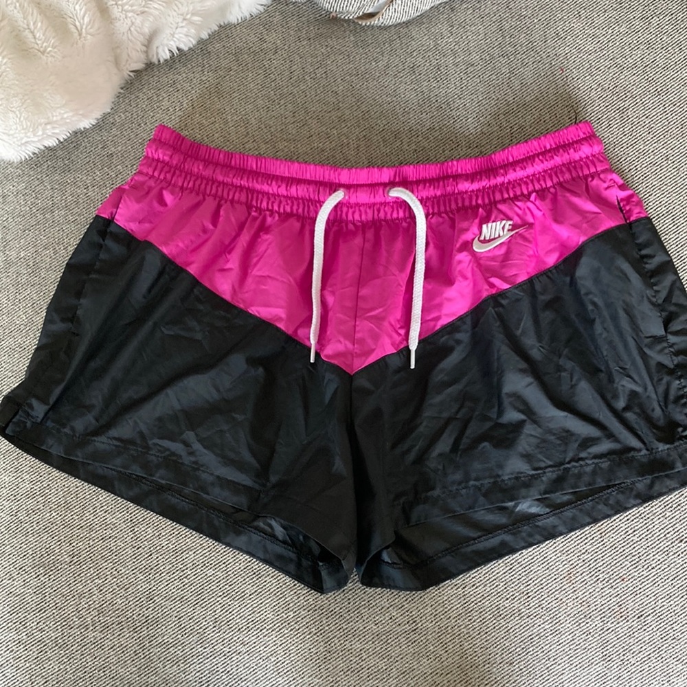 Nike athletic shorts. Black and Pink.